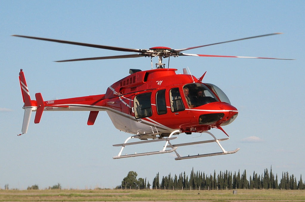 Bell 407 in rich red